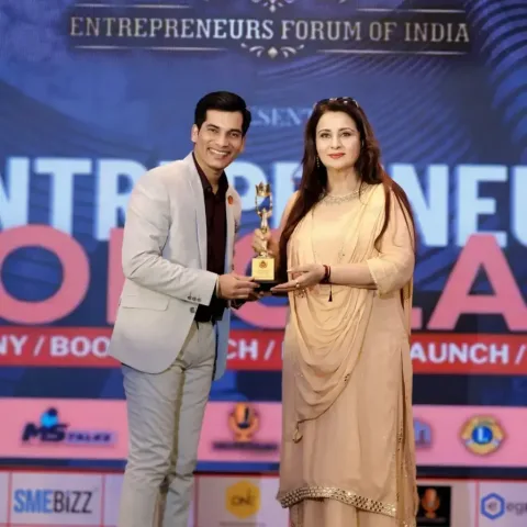 Award presentation with Poonam Dhillon