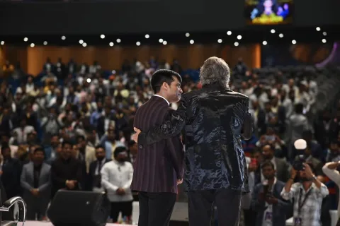 Summit hosts looking across the full audience